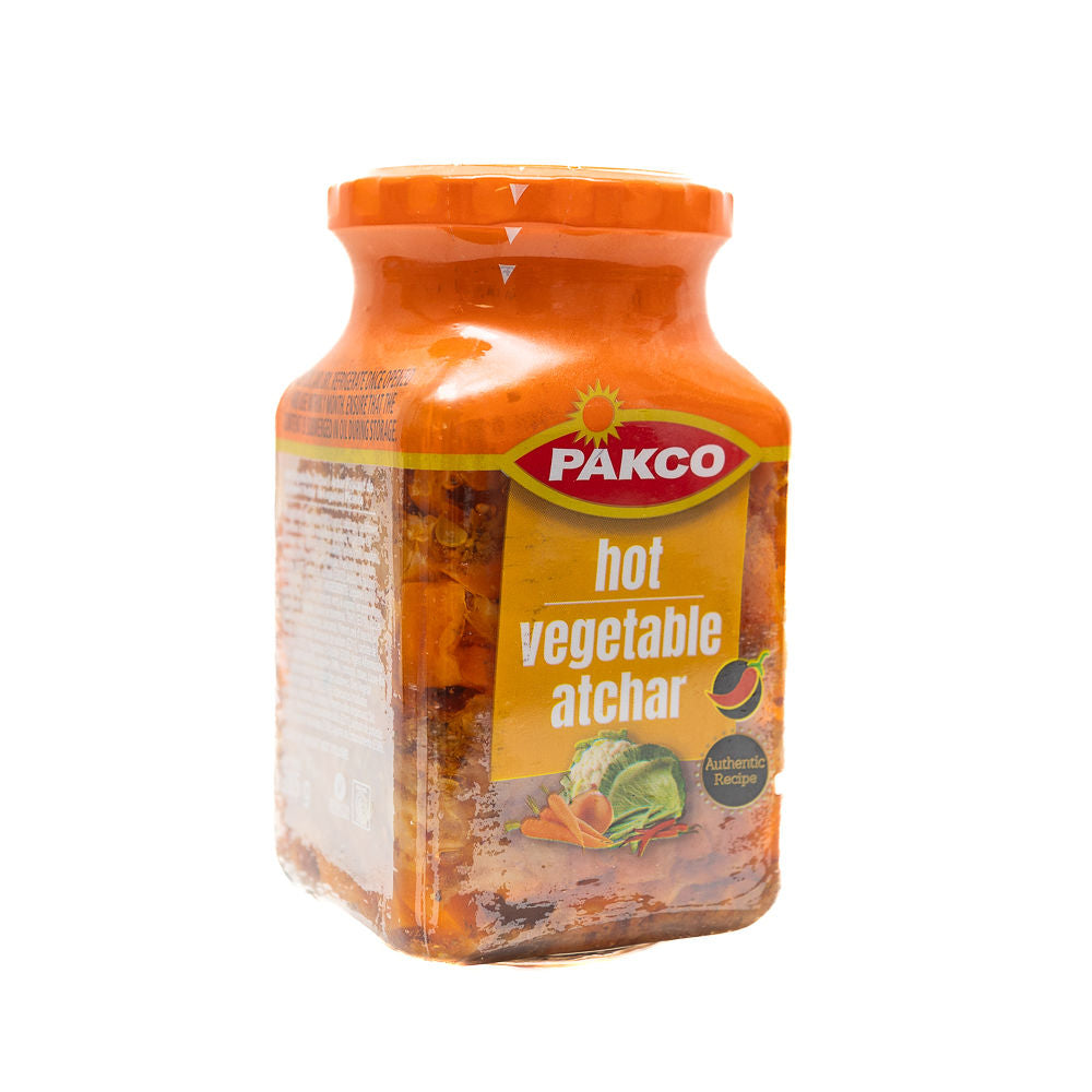 A jar of Pakco Hot Vegetable Atchar from Biltong Direct with a label showing the product name and a picture of the pickled vegetables.