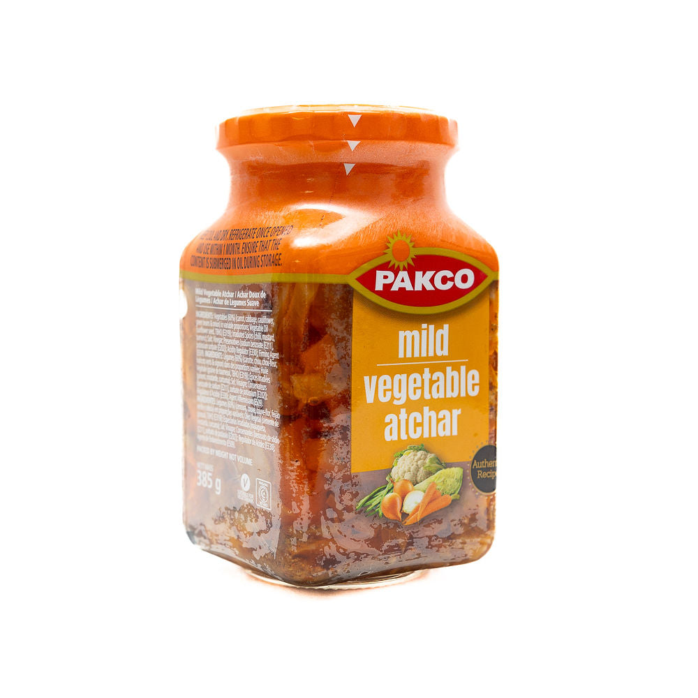 A jar of Pakco Mild Vegetable Atchar from Biltong Direct with a label showing the product name and a picture of the pickled vegetables.