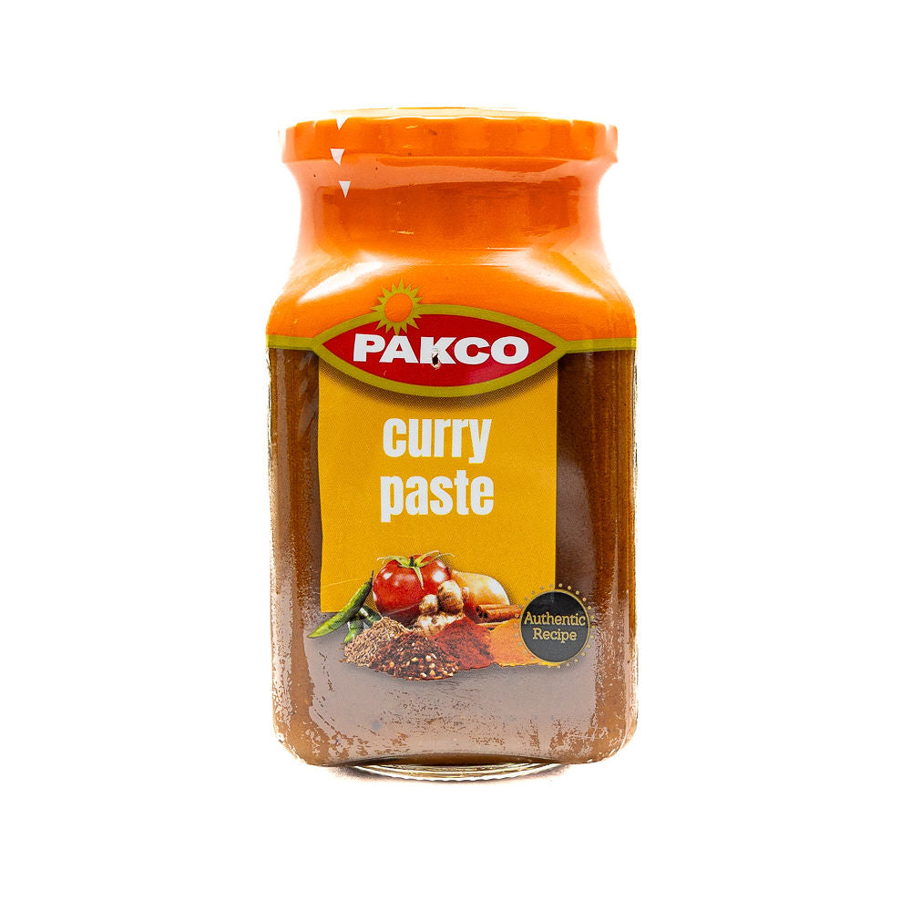 A jar of Pakco Curry Paste, 400g from Biltong Direct. The label shows the brand name 'Pakco' and the product name 'curry paste'.