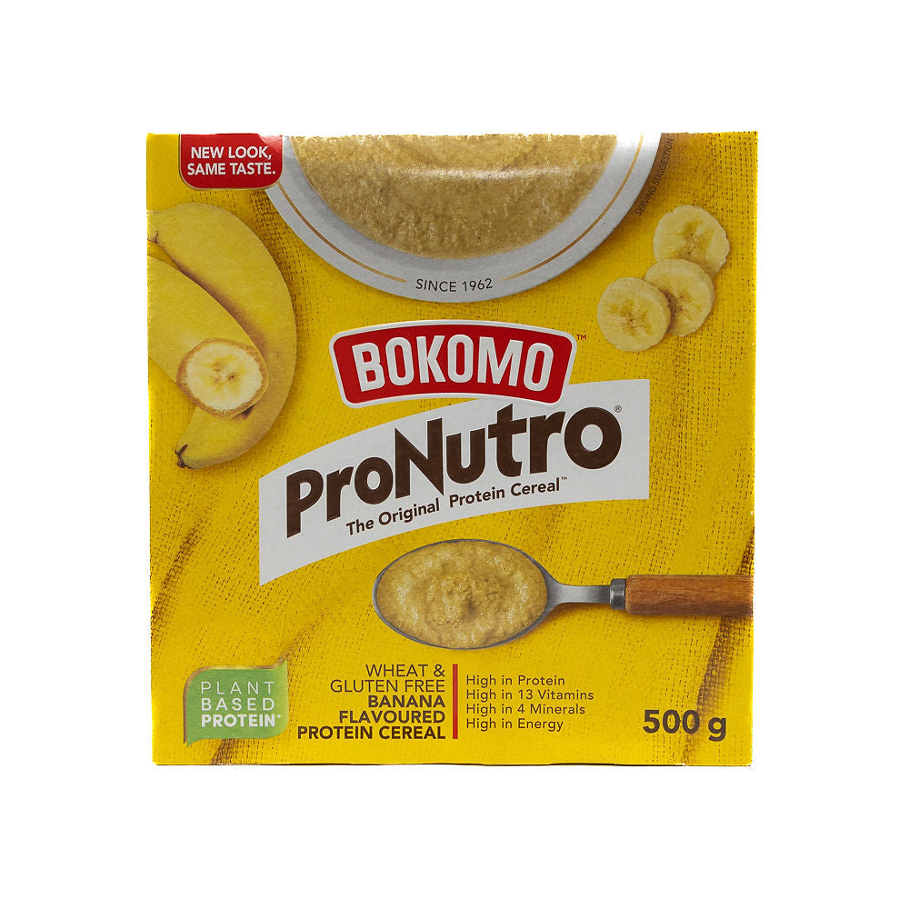 A box of Bokomo ProNutro Banana Wheat Free cereal from Biltong Direct. The packaging is yellow with images of the cereal, bananas, and a spoon.