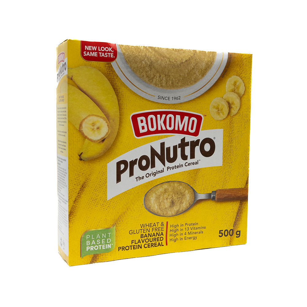 A box of Bokomo ProNutro Banana Wheat Free cereal from Biltong Direct. The packaging is yellow with images of the cereal, bananas, and a spoon.