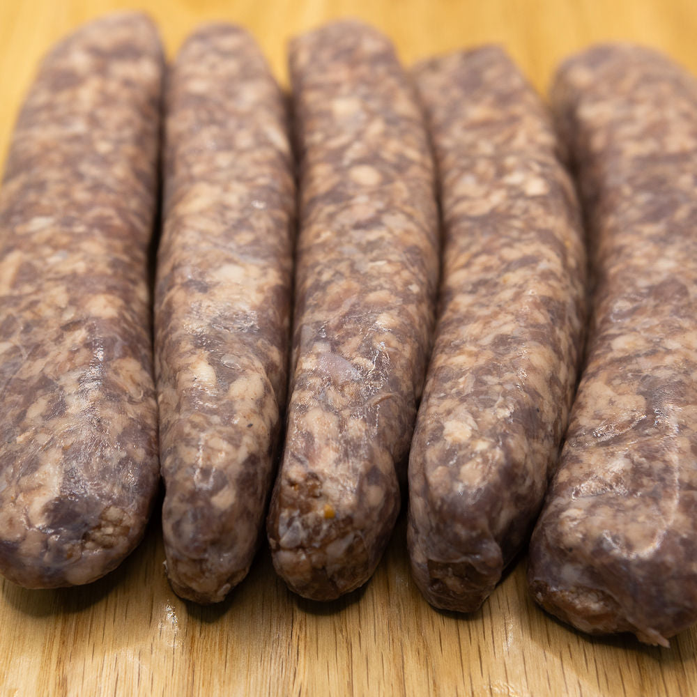 A pack of five traditional flavoured boerewors fingers from Biltong Direct on a wooden surface.