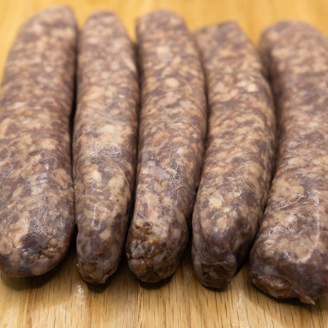 A pack of five traditional flavoured boerewors fingers from Biltong Direct on a wooden surface.