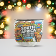 Colorful South Africa-themed pouch with travel graphics on a blurred festive background