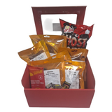 Red gift basket with various snack packages including biltong, snap sticks droewors, Simba and Safari brands, from Biltong Direct