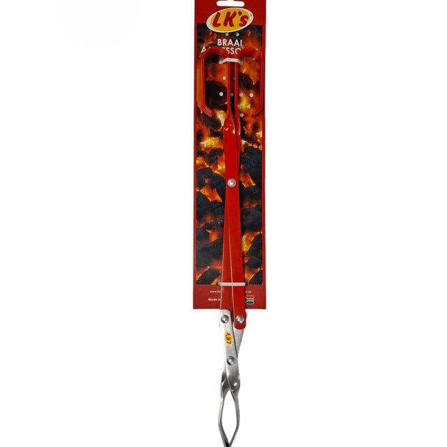 A pair of LK's branded braai tongs from Biltong Direct with a red handle , displayed against a packaging background with fire graphics.