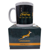 green coffee mug with 'World Champions' text on a Springboks branded box